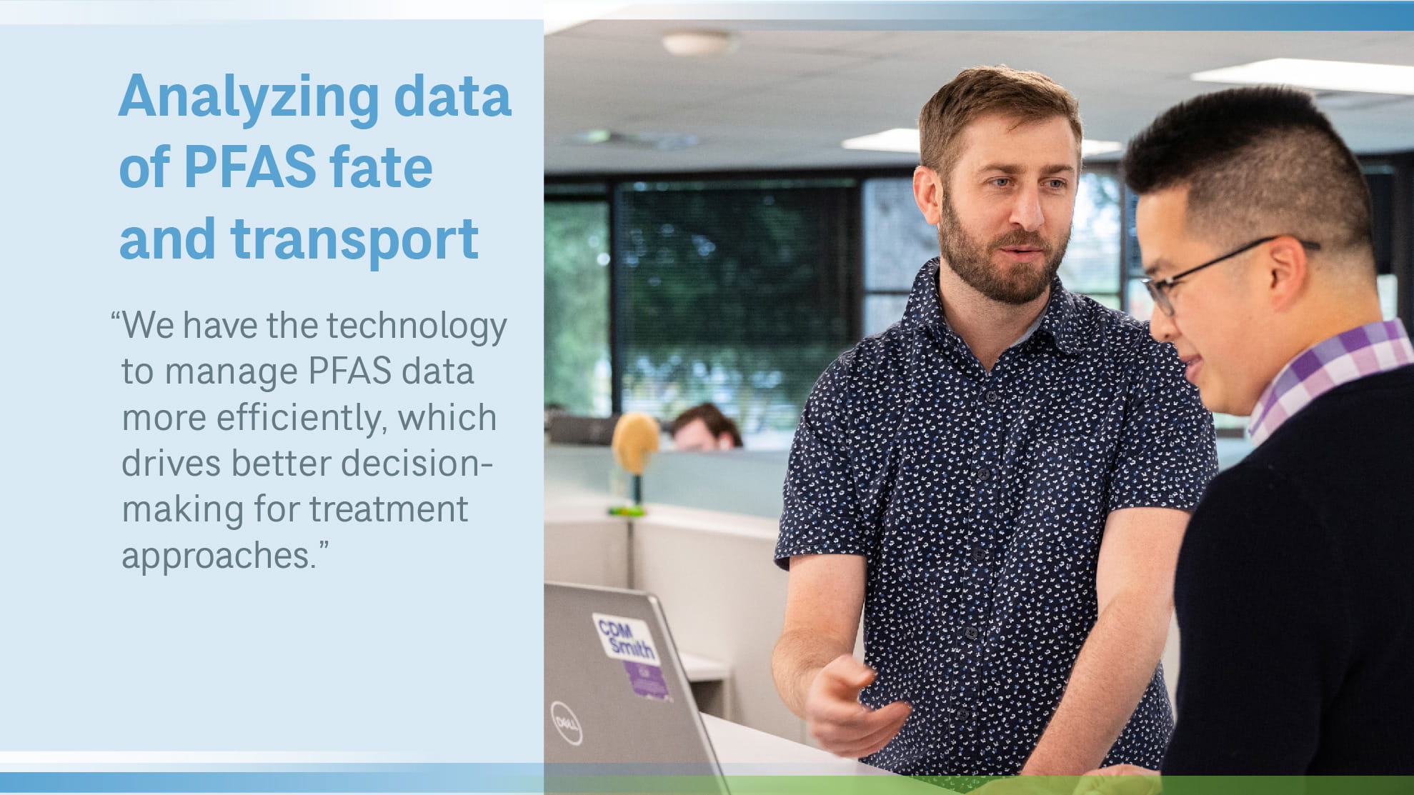 John Stults in office talking to a man