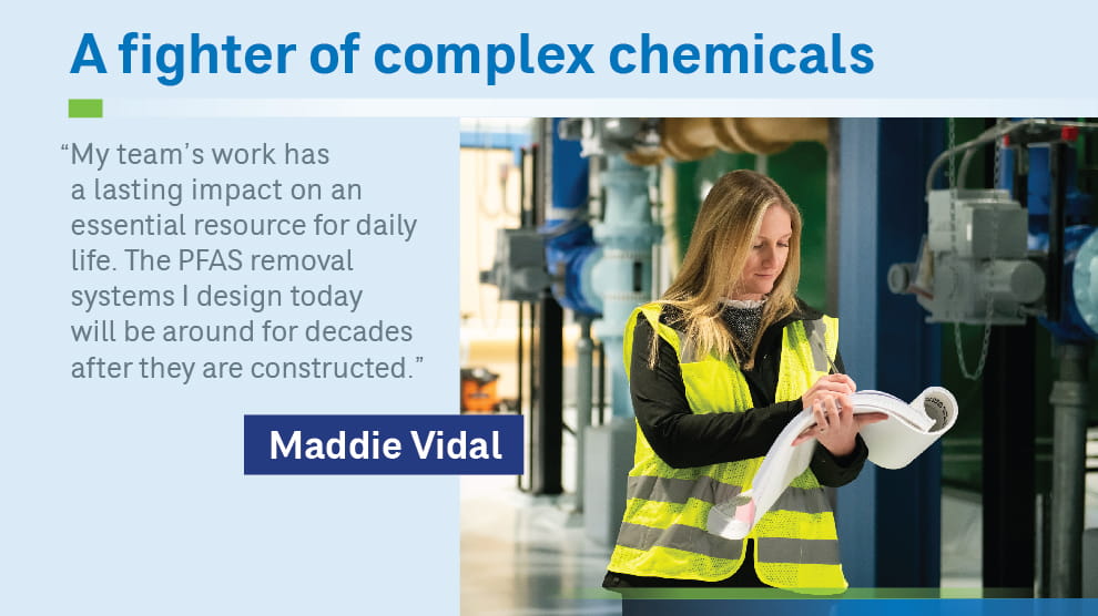 Maddie Vital with plans in water plant