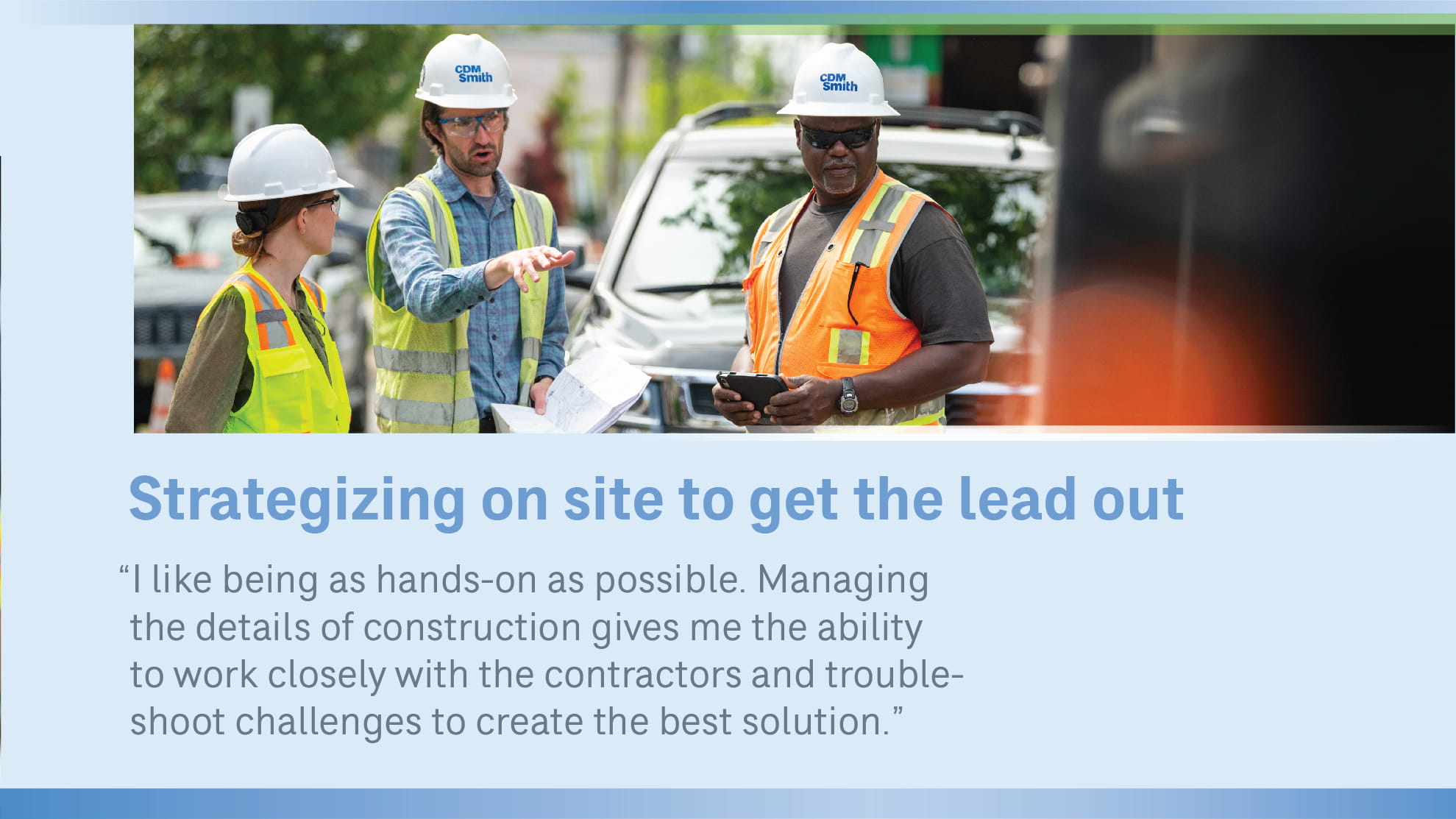 3 people in hardhats on construction site