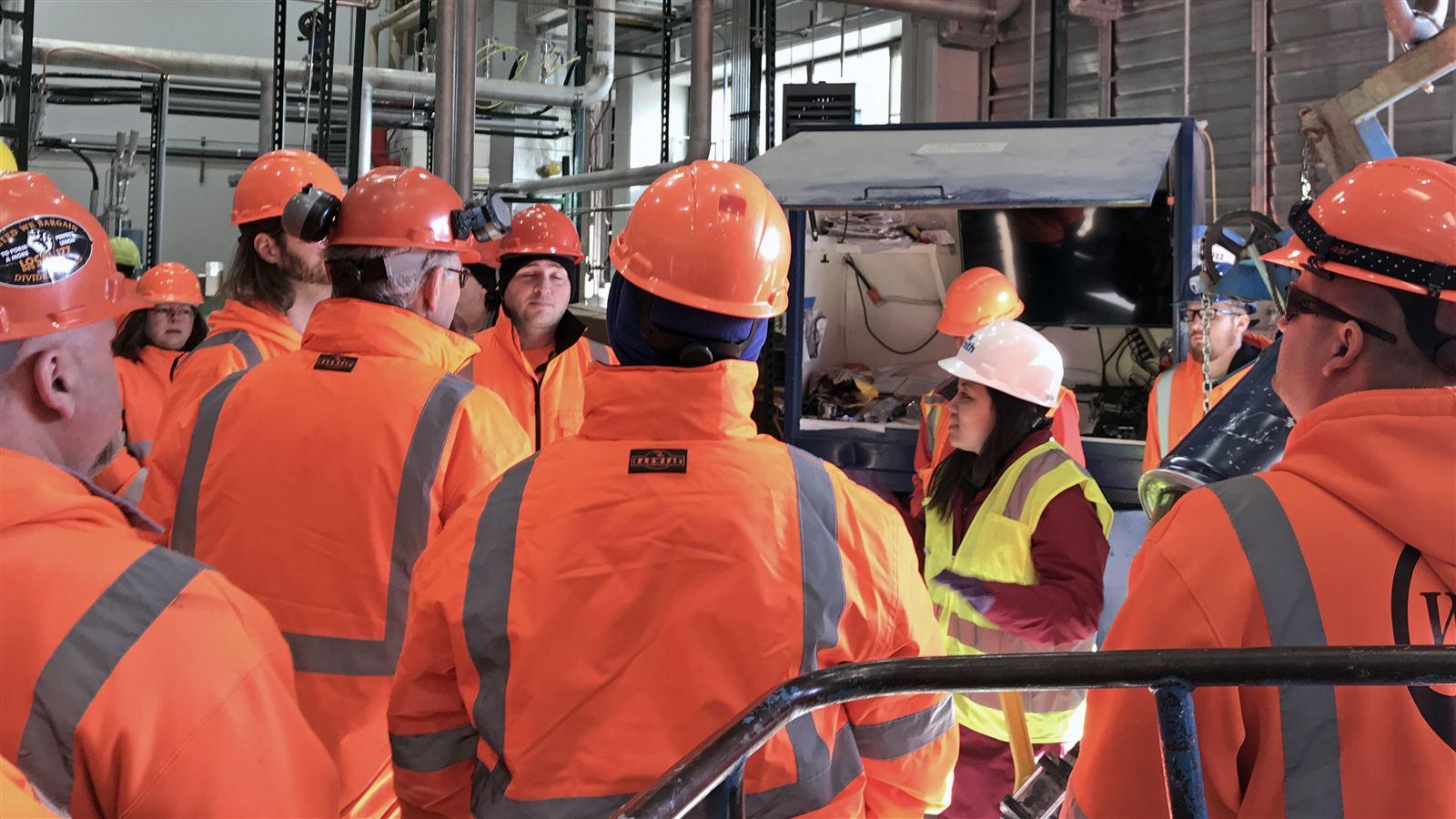 meeting on plant floor